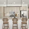 kitchen showing an island, bright lighting and modern appliances